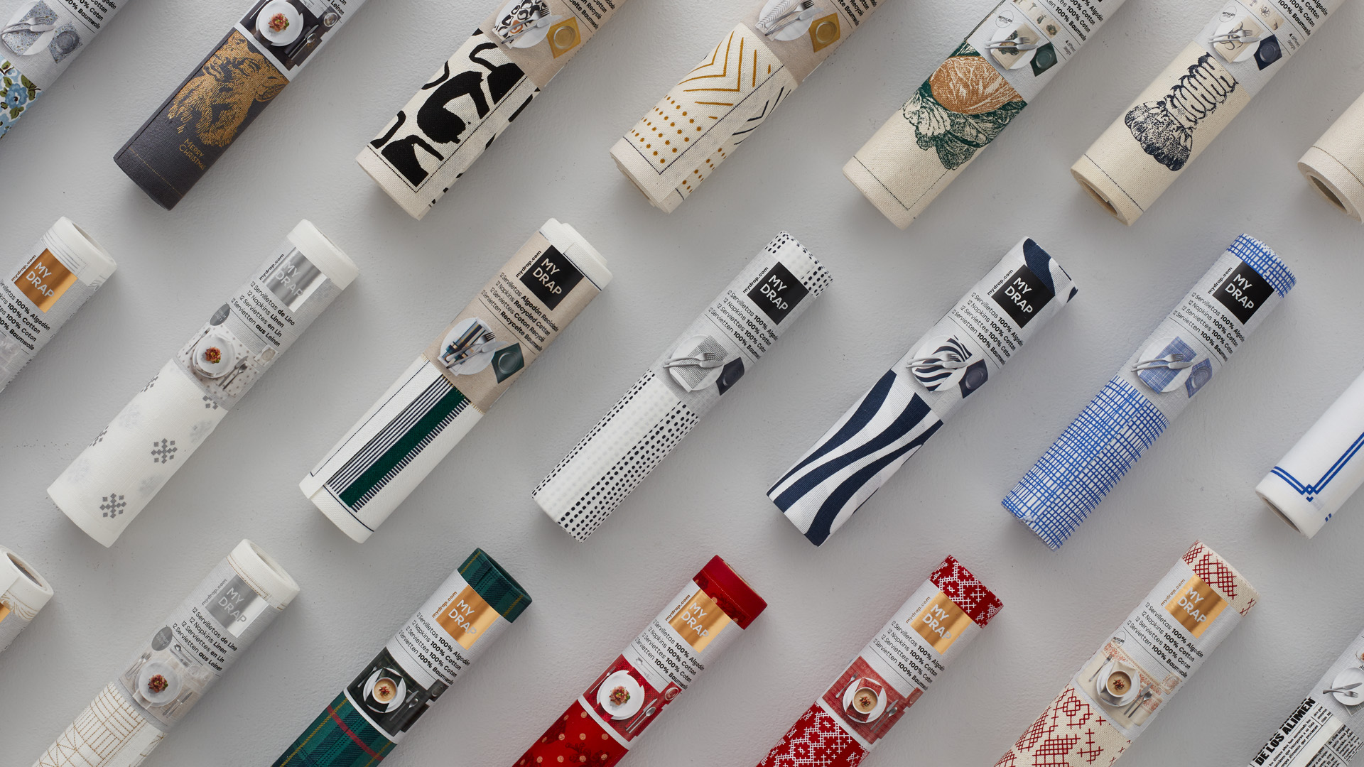 Sistema de packaging manteles y servilletas MY DRAP por Nomon Design, agencia de branding, diseño gráfico y packaging de Barcelona.