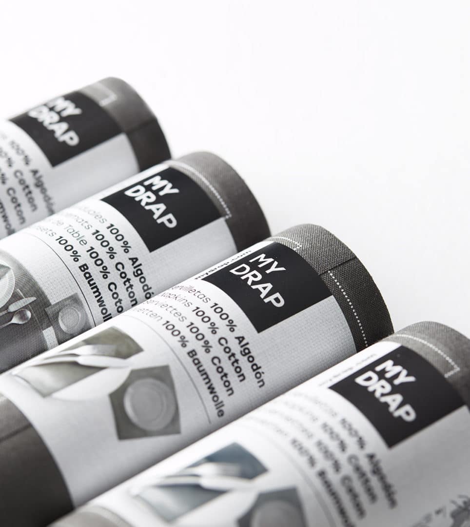 Diseño de packaging manteles y servilletas MY DRAP por Nomon Design, agencia de branding