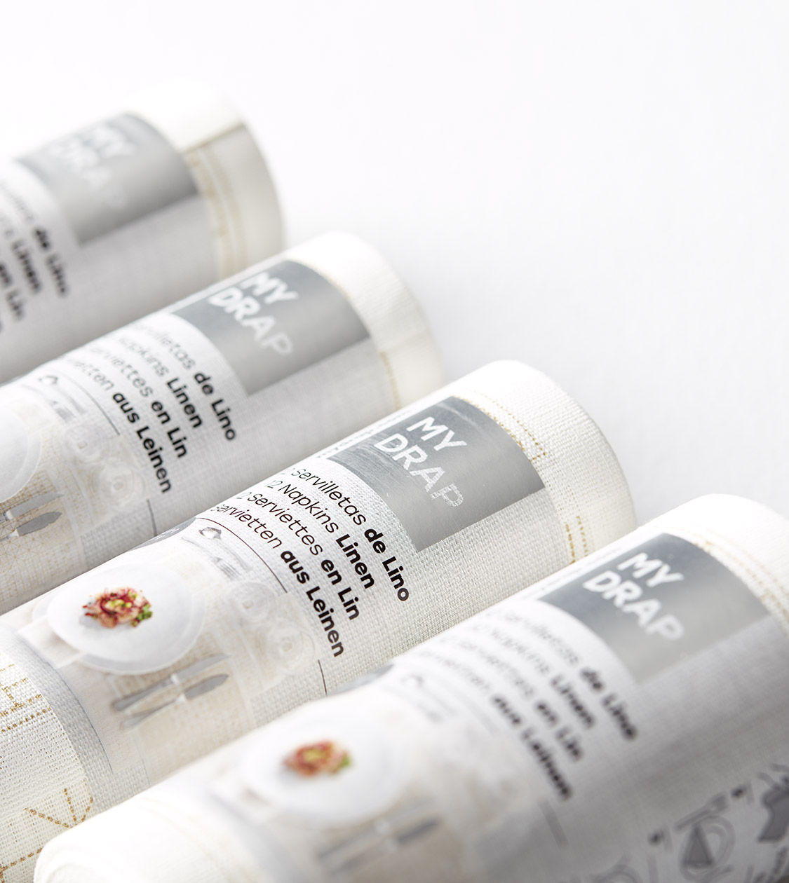 Diseño de packaging manteles y servilletas MY DRAP por Nomon Design, agencia de branding