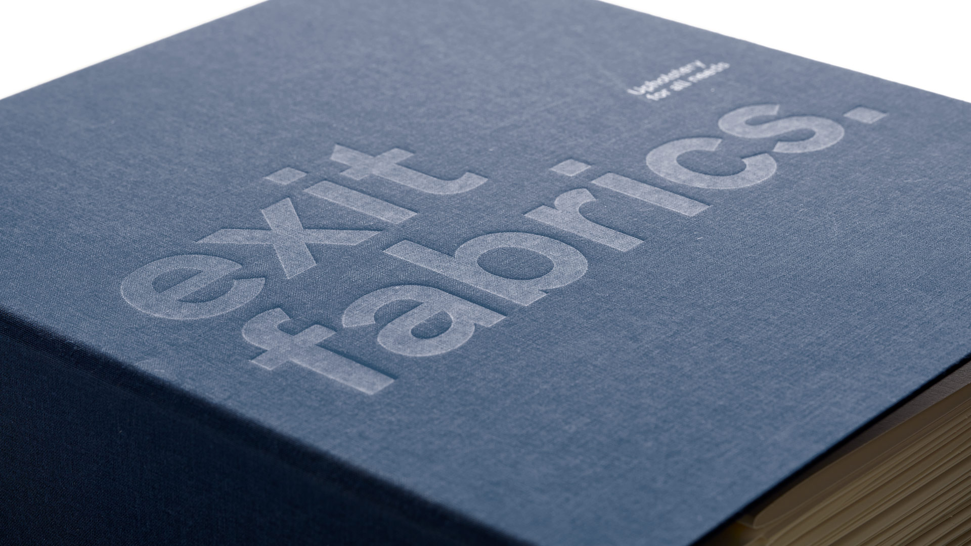 Nuevo tagline de la estrategia de branding para Exit Fabrics por Nomon Design, agencia de branding