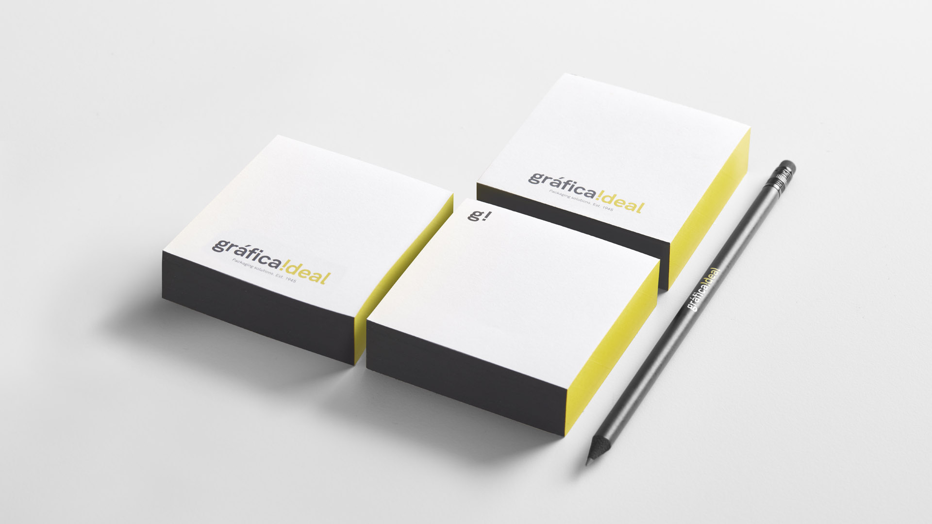 Aplicación del branding corporativo de Gráfica Ideal en sus tarjetas corporativas por Nomon Design, agencia de branding