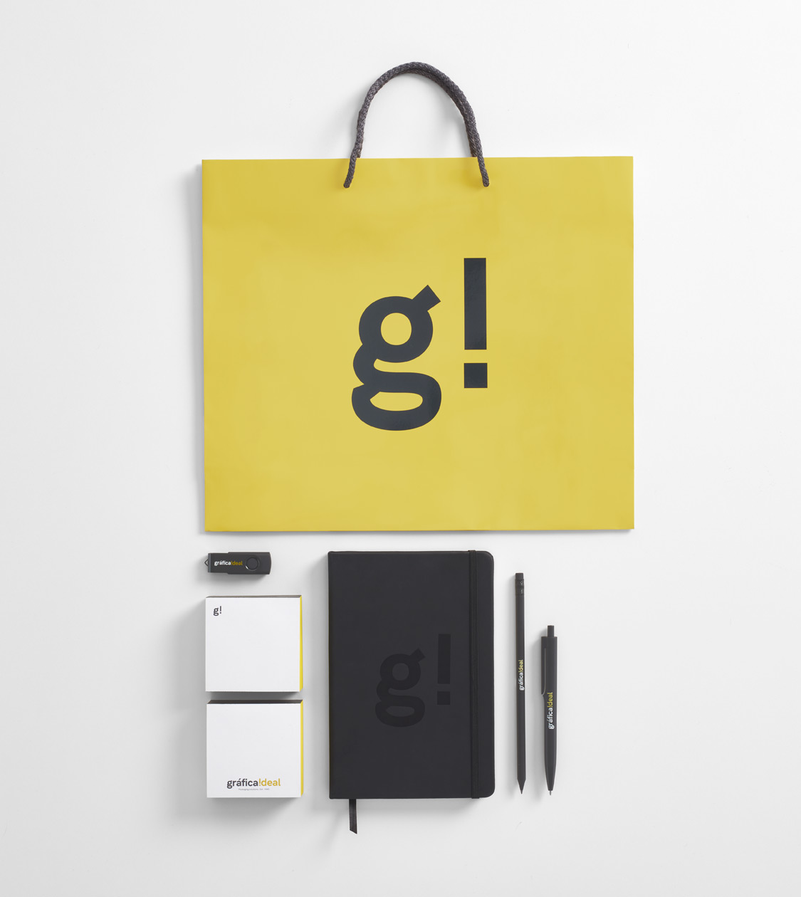 Aplicación del branding corporativo de Gráfica Ideal en sus materiales de comunicación por Nomon Design, agencia de branding