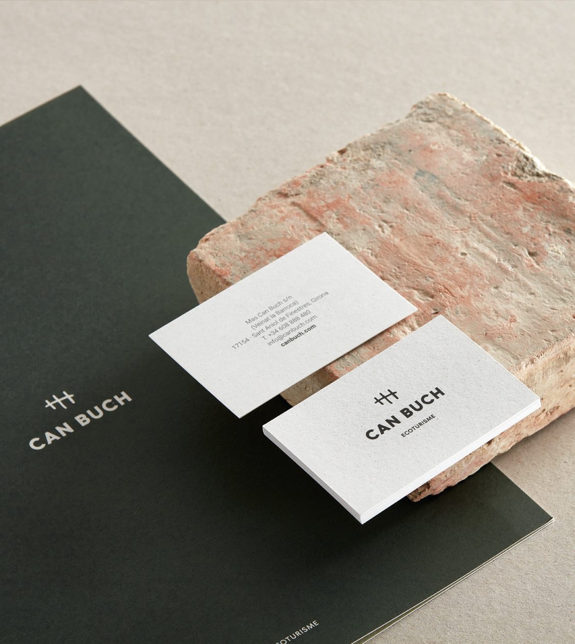 Branding corporativo de Can Buch aplicado en material por Nomon Design, agencia de branding