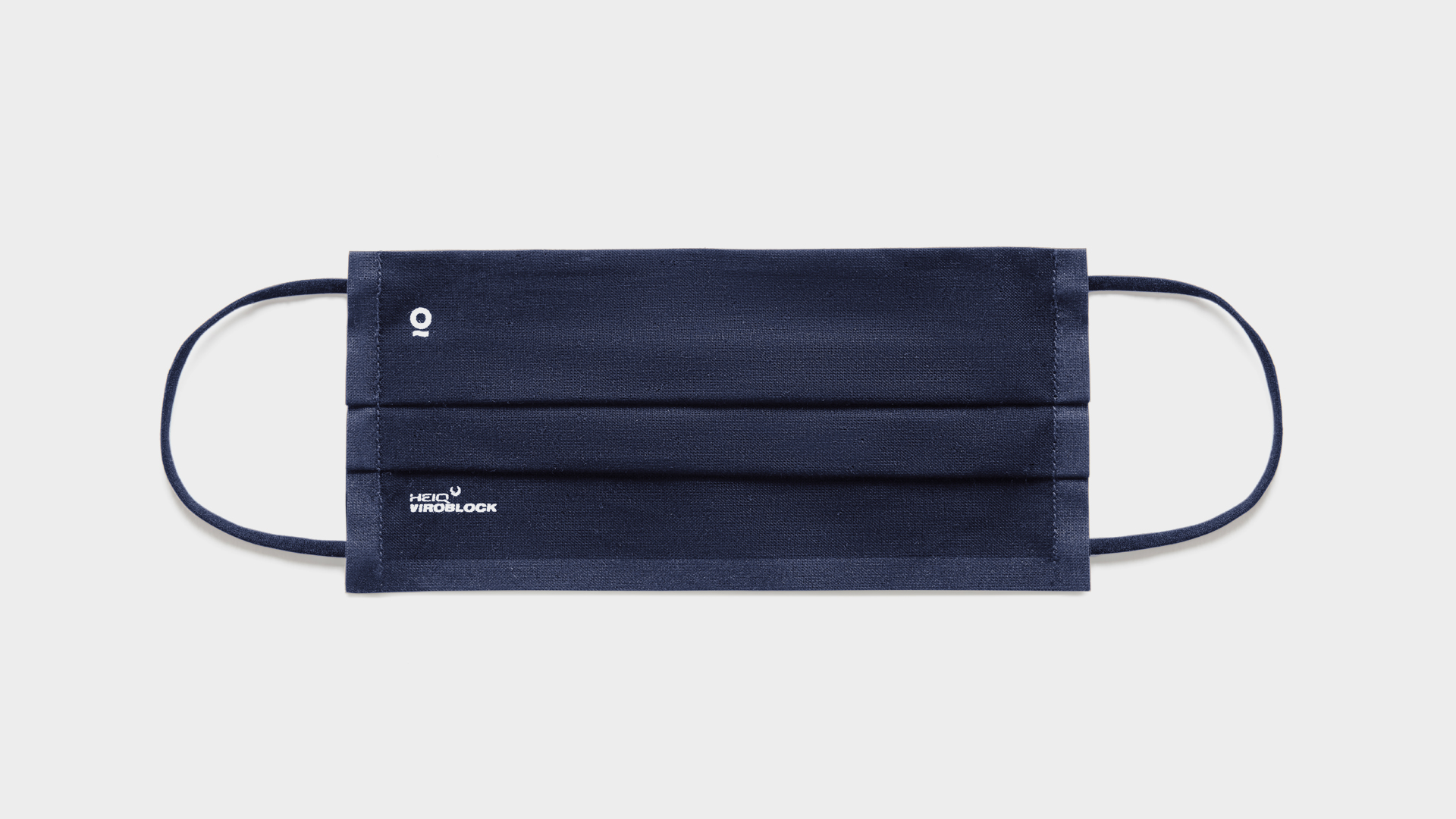 Aplicación del nuevo branding de Roll Drap en mascarilla textil por Nomon Design, agencia de branding