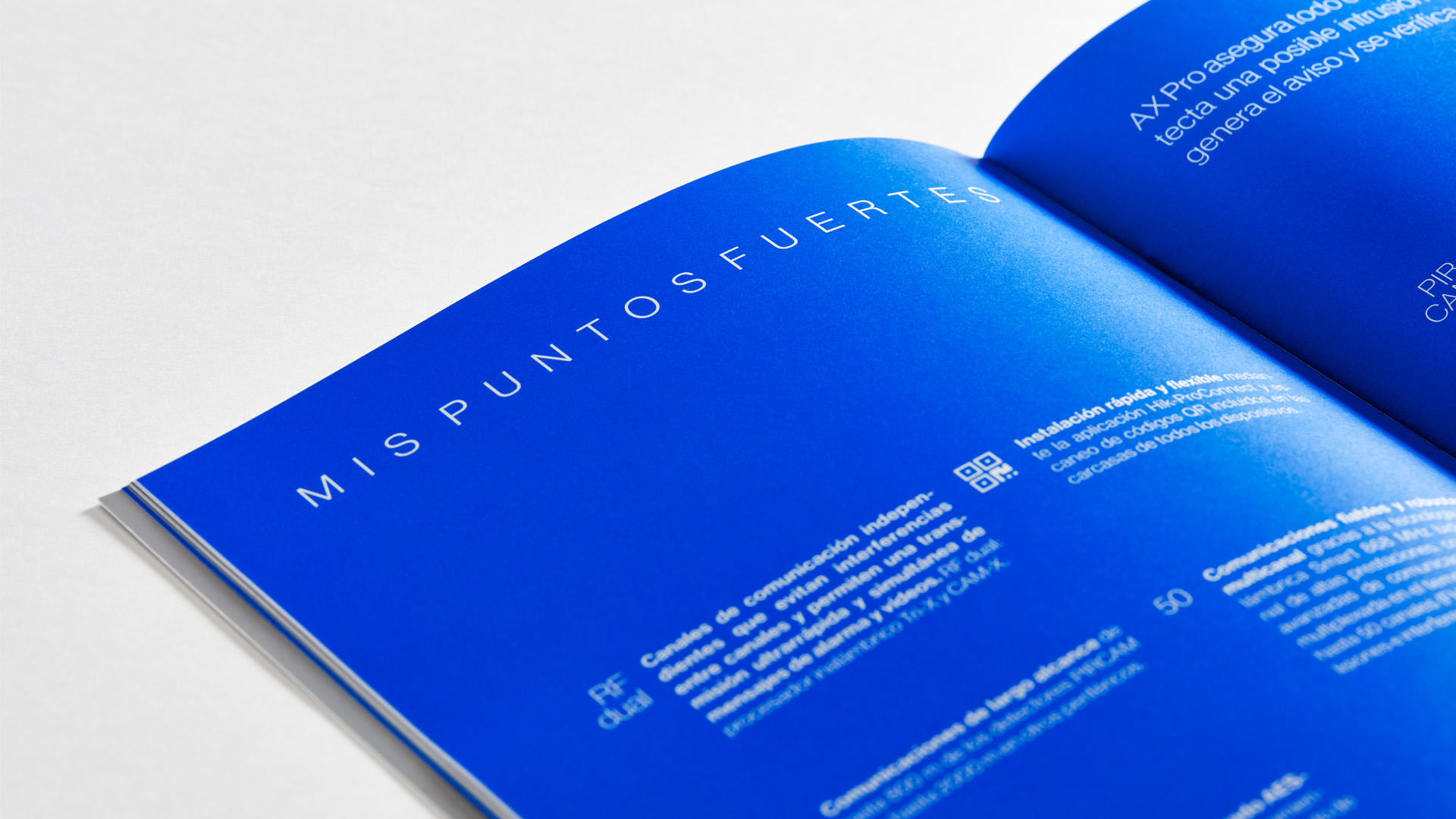 Detalle del interior del catálogo de AX Pro de Casmar por Nomon Design, agencia de branding