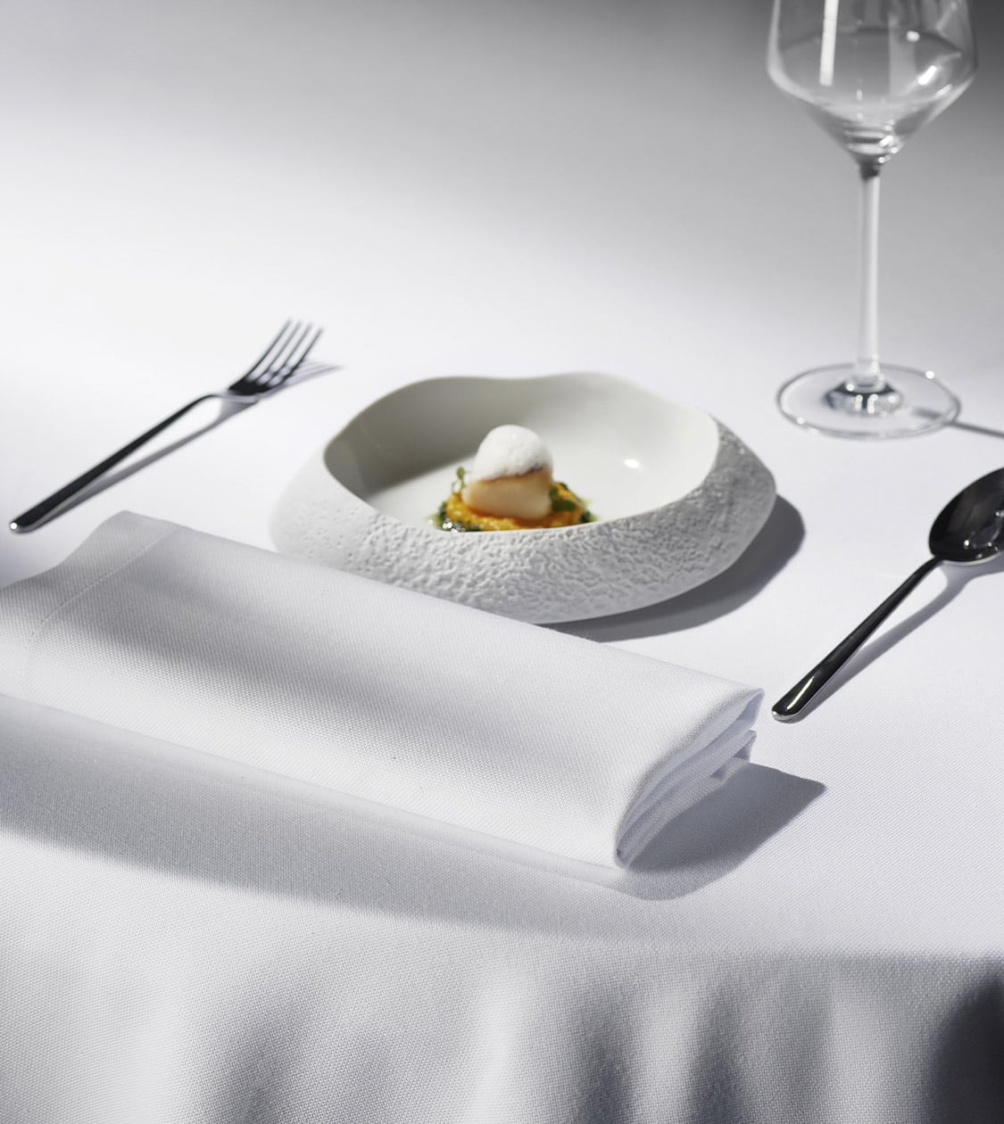 Branding corporativo de Athos creado por NOMON DESIGN, agencia de branding de Barcelona, para el sector gastronómico