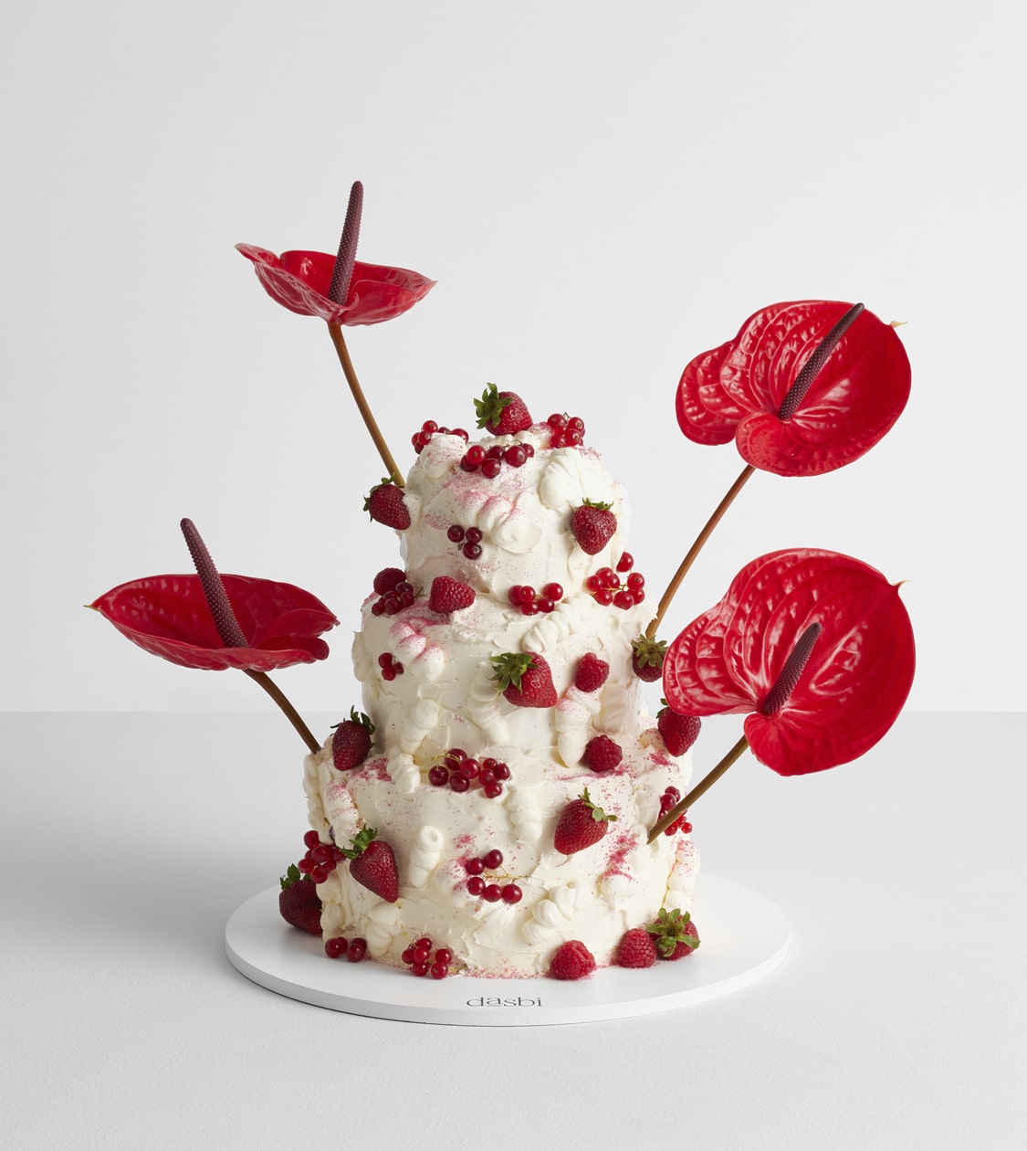 Aplicación en tarta de diseño del branding de Dasbi, diseñado por NOMON DESIGN, agencia de branding de Barcelona
