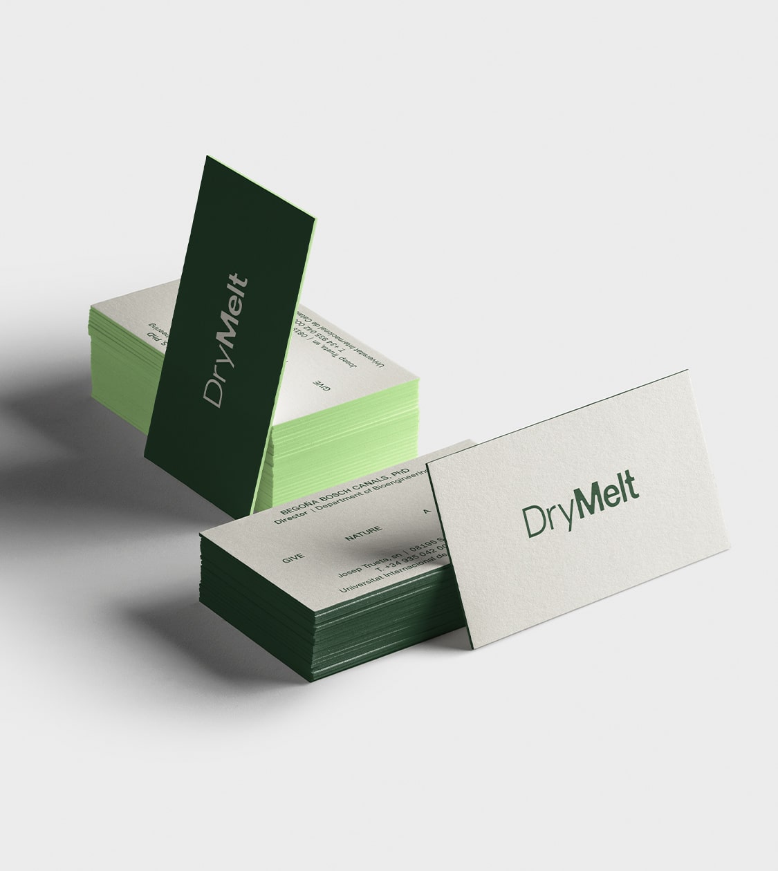 Tarjetas de visita corporativas de la marca DryMelt, desarrollada por Nomon Design, agencia de branding